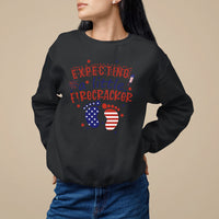 Black pregnancy announcement sweatshirt with expecting a little firecracker graphic and flag circles