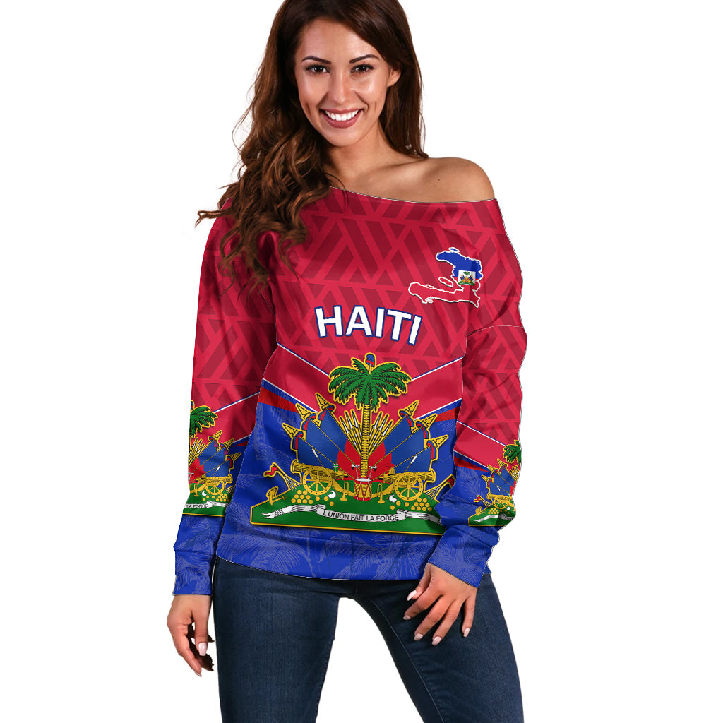 Red off-shoulder sweater with Haiti graphic and flag emblem across chest