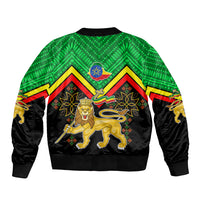 Unisex bomber jacket, black with green patterned shoulders and centered Ethiopia coat of arms