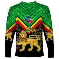 Green and black long-sleeve shirt with Ethiopia crest, lion in blue emblem, chevron pattern.