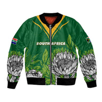 Green bomber jacket with black rib trim, front zipper, South Africa text and floral print