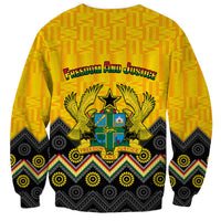 Yellow sweatshirt with kente and adinkra patterns, back 'Freedom and Justice' crest