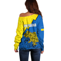 Women’s off-shoulder sweater with Ukraine folk pattern, yellow and blue, back view
