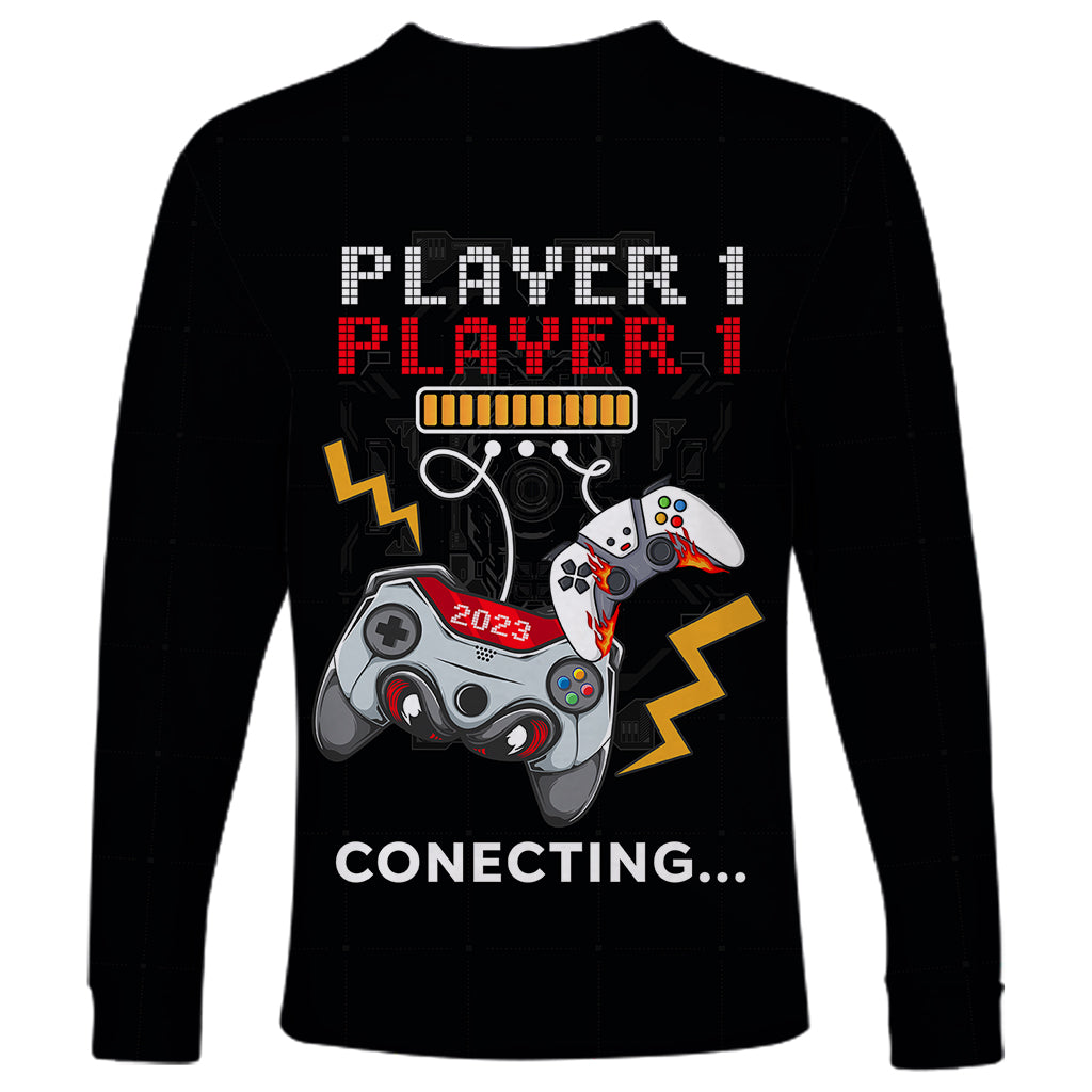 Black long-sleeve shirt with Player 1 game graphic and Connecting... text