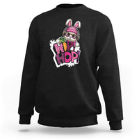 Black crewneck sweatshirt with colorful bunny graphic on chest, long sleeves.