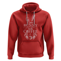 Red pullover hoodie with drawstring hood and “Some Bunny needs Coffee” graphic