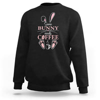 Black crewneck sweatshirt with “Some Bunny needs Coffee” bunny graphic on chest