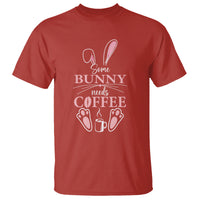 Red crewneck t-shirt with bunny 'needs coffee' graphic.