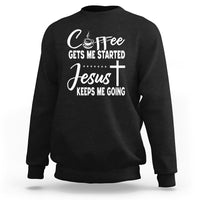 Black sweatshirt with “Coffee Gets Me Started / Jesus Keeps Me Going” text graphic