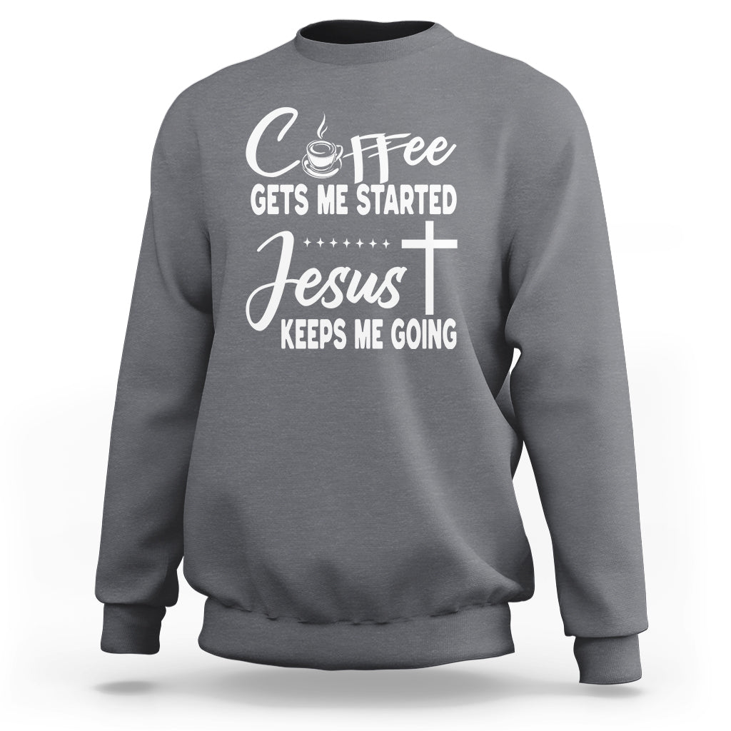 Charcoal gray sweatshirt with “Coffee Gets Me Started / Jesus Keeps Me Going” text graphic