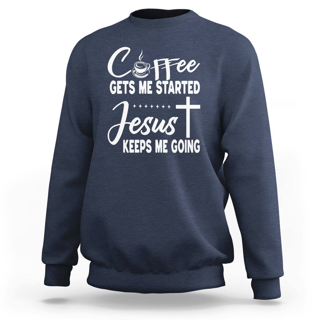 Navy blue sweatshirt with “Coffee Gets Me Started / Jesus Keeps Me Going” text graphic