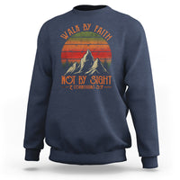 Navy crewneck sweatshirt with front graphic text and mountain faith scene