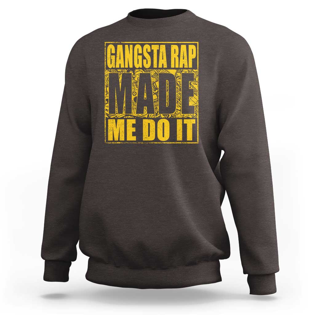 Dark chocolate crewneck sweatshirt with front graphic text 'GANGSTA RAP MADE ME DO IT'.