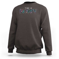 Dark chocolate brown sweatshirt with “Time is Money” front graphic and crew neck