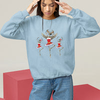 Light blue Christmas sweatshirt with skeleton dancer and ballerina graphic, long sleeves.