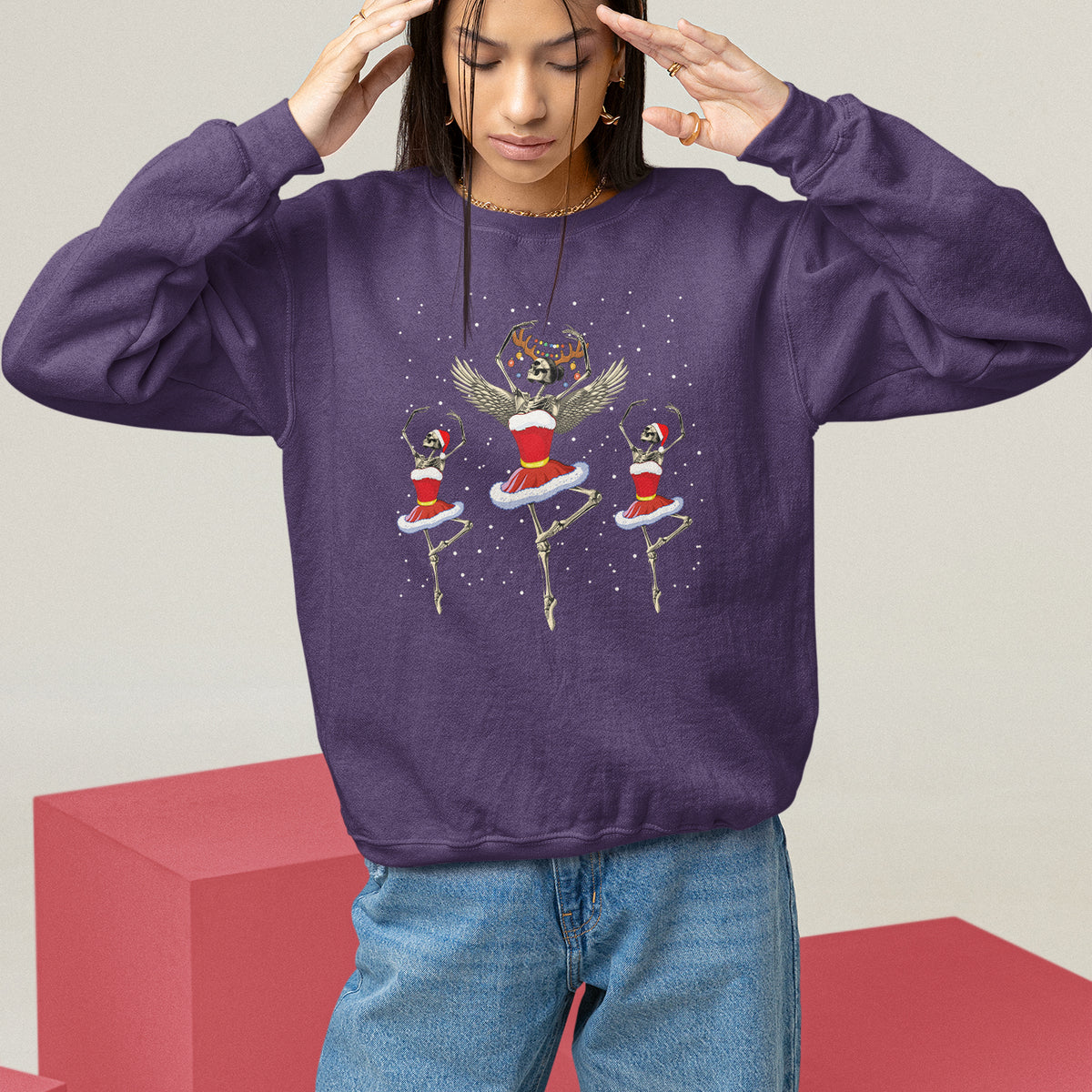 Purple Christmas sweatshirt with skeleton dancer and ballerina graphic, long sleeves.