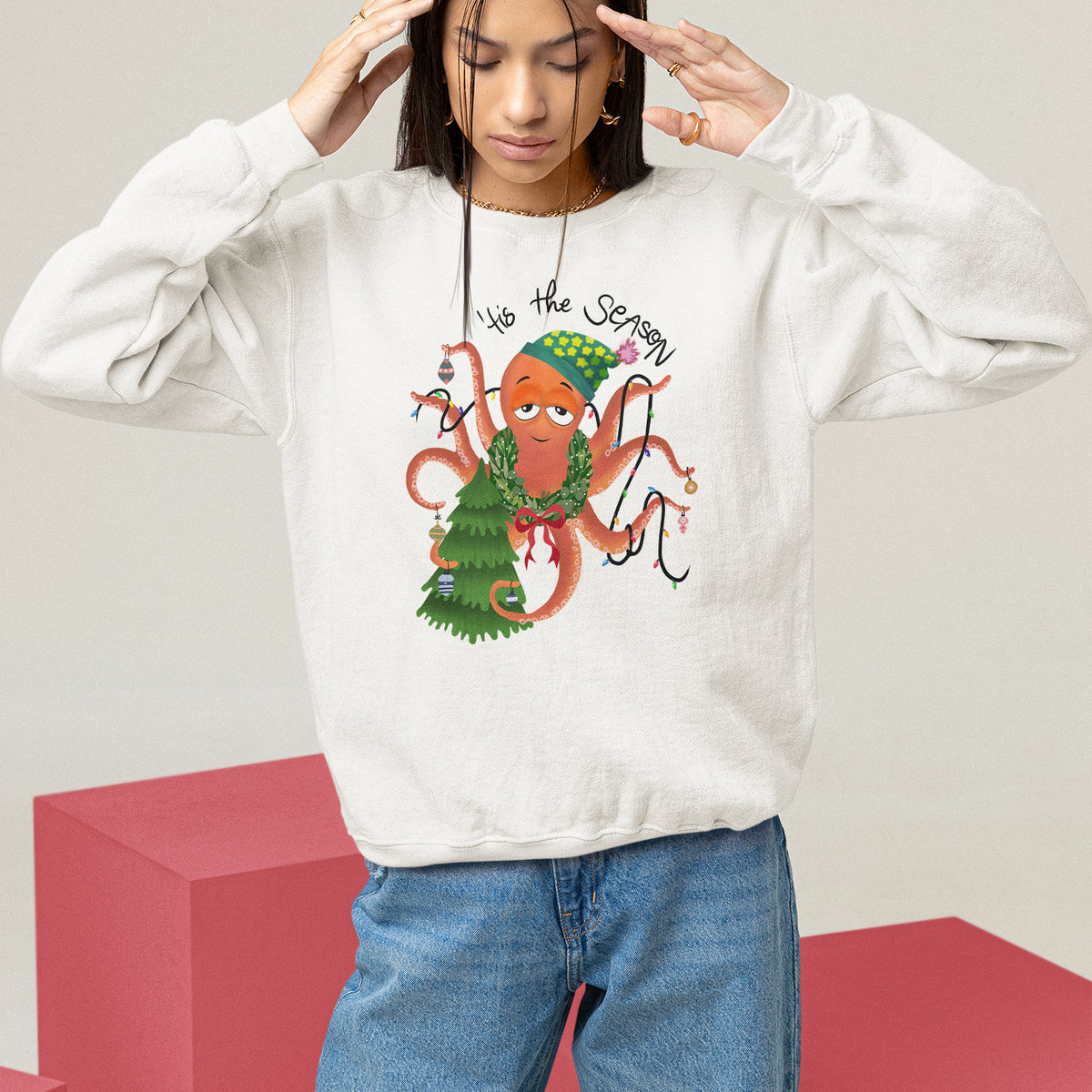 White Christmas sweatshirt with colorful octopus holiday graphic at the chest