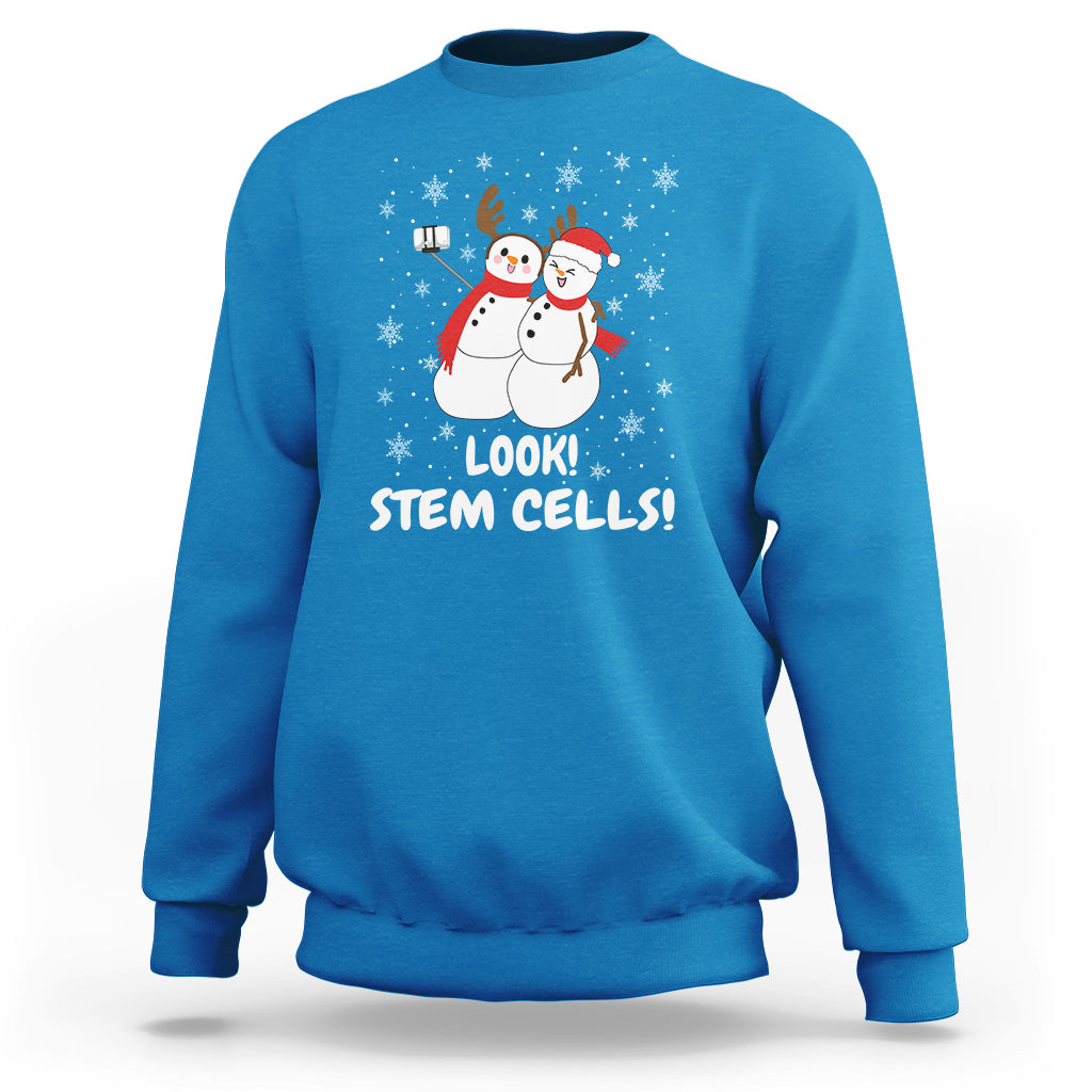 Sapphire blue crewneck sweatshirt with snowman STEM graphic and 'LOOK! STEM CELLS!'