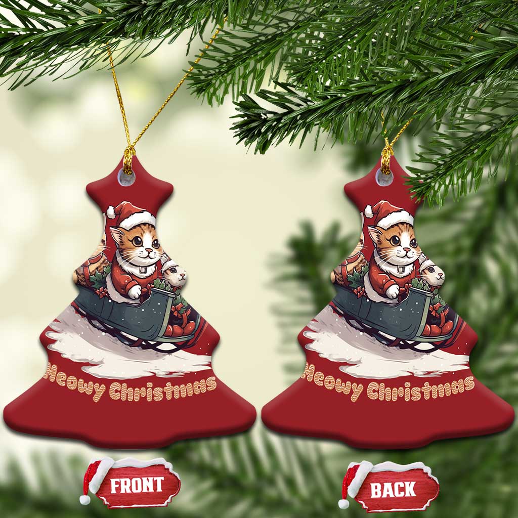 Set of red bell-shaped cat sleigh Christmas ornaments, gold hangers, “Meowy Christmas”.