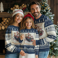 Navy and cream ugly Christmas sweater with cat sleigh front graphic and tree trim