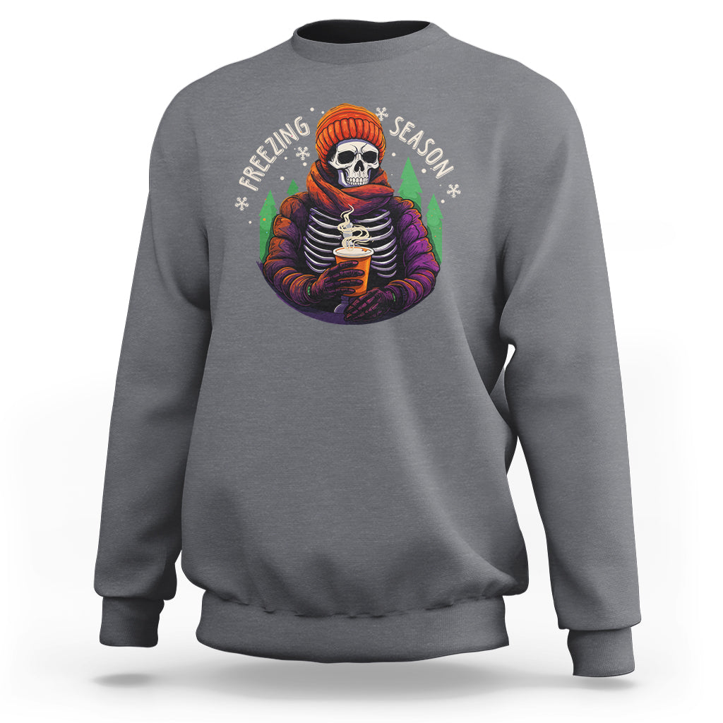 Charcoal gray crewneck sweatshirt with skeleton holding hot cocoa graphic on the chest