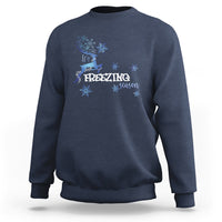 Navy crewneck sweatshirt with blue reindeer and snowflake graphic, “Freezing Season”