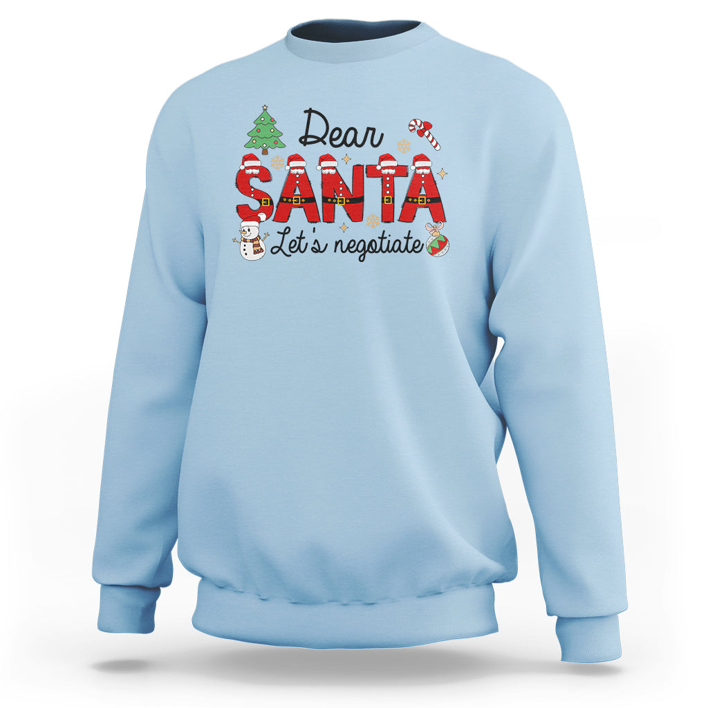 Light blue Christmas sweatshirt with "Dear Santa Let's negotiate" graphic, crewneck long sleeves
