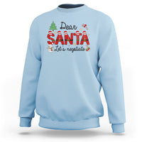 Light blue Christmas sweatshirt with "Dear Santa Let's negotiate" graphic, crewneck long sleeves