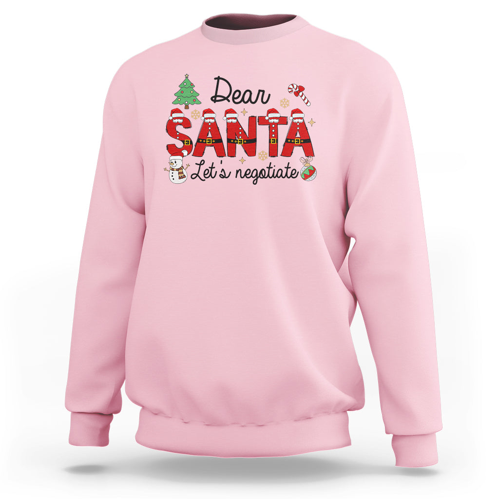 Light pink Christmas sweatshirt with "Dear Santa Let's negotiate" graphic, crewneck long sleeves