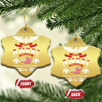 Pair of gold star-shaped ornaments with eagle and “Have Ameri Christmas” patriotic graphic