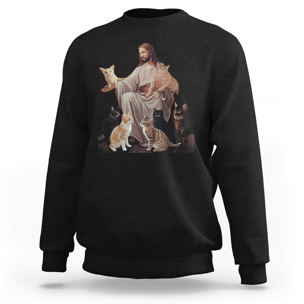 Black sweatshirt with front graphic of Jesus hugging cats