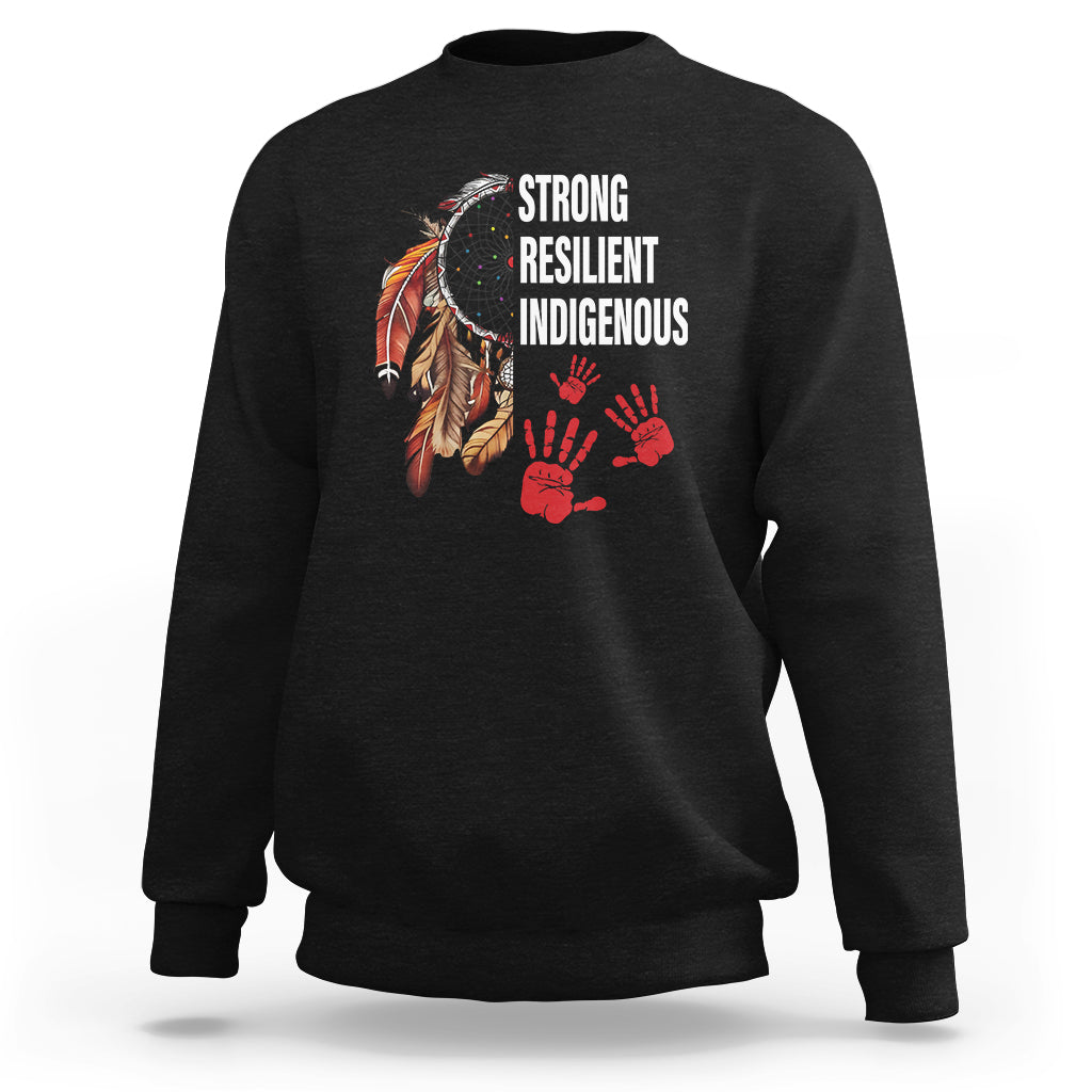 Women's black crewneck sweatshirt with feather graphic and red handprint 'Strong Resilient Indigenous'