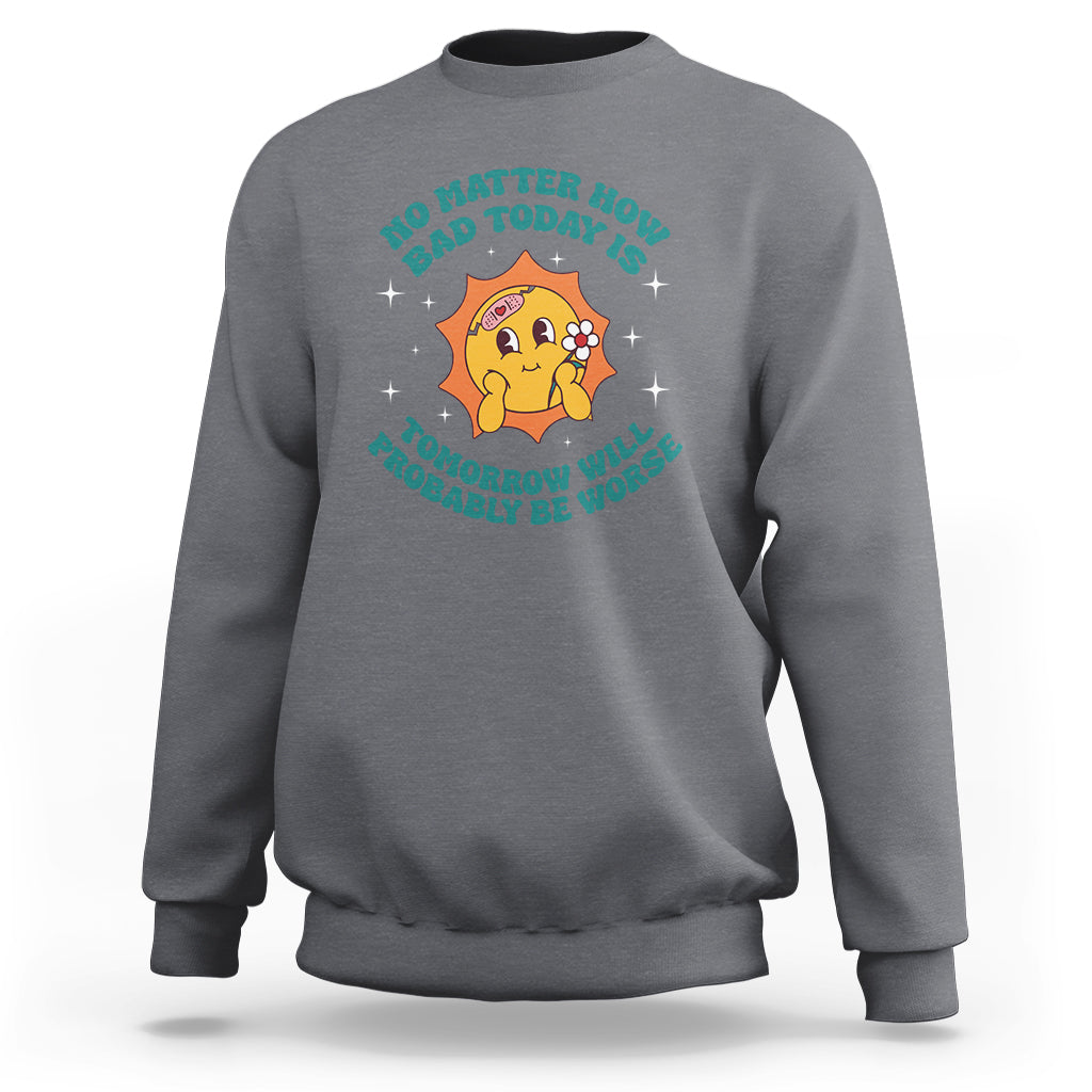 Gray crewneck sweatshirt with cartoon heart and text graphic on chest