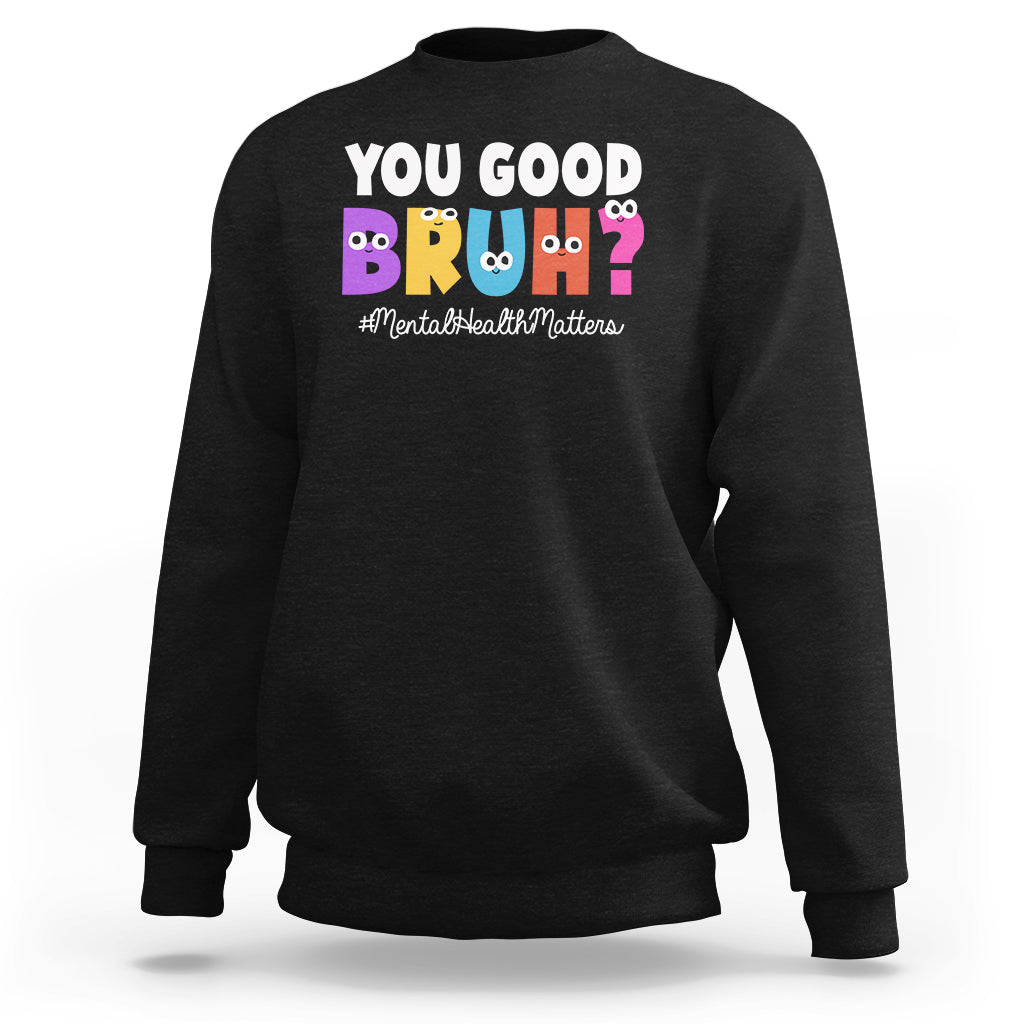 Black sweatshirt with “YOU GOOD BRUH!” mental health graphic on the chest