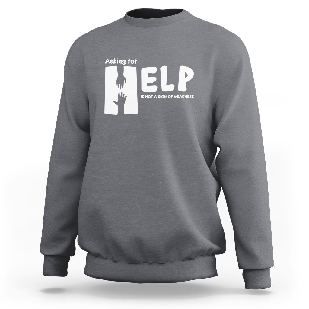 Gray sweatshirt with white “HELP” graphic and “Asking for” text on the chest