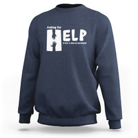 Blue sweatshirt with white “HELP” graphic and “Asking for” text on the chest