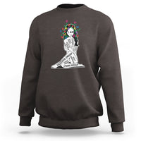 Charcoal brown crewneck sweatshirt with colorful “I AM” portrait graphic and motivational text