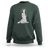 Dark forest green crewneck sweatshirt with colorful “I AM” portrait graphic and text