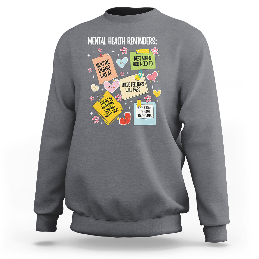 Charcoal gray crewneck sweatshirt with colorful mental health reminder quote graphic