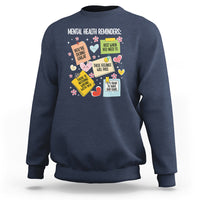 Navy crewneck sweatshirt with colorful mental health reminder quote graphic