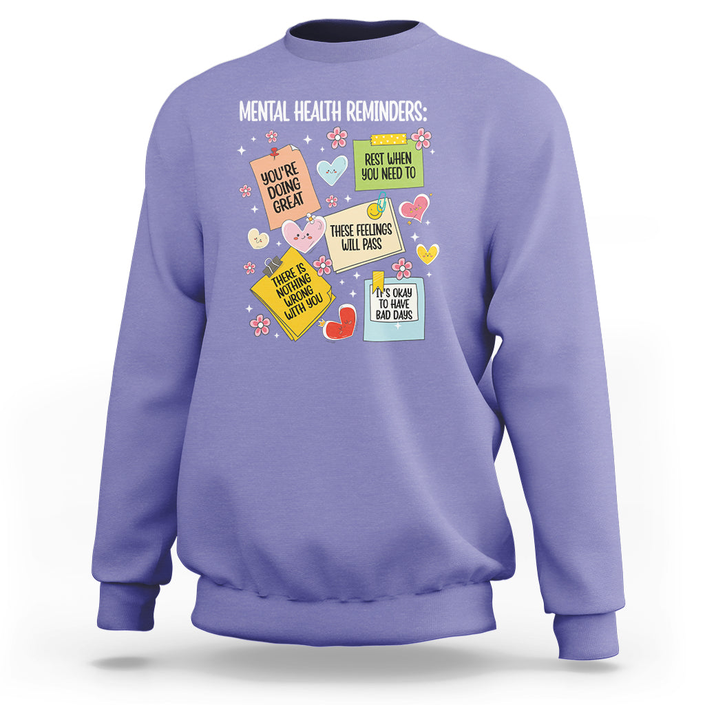 Light purple crewneck sweatshirt with colorful mental health reminder quote graphic