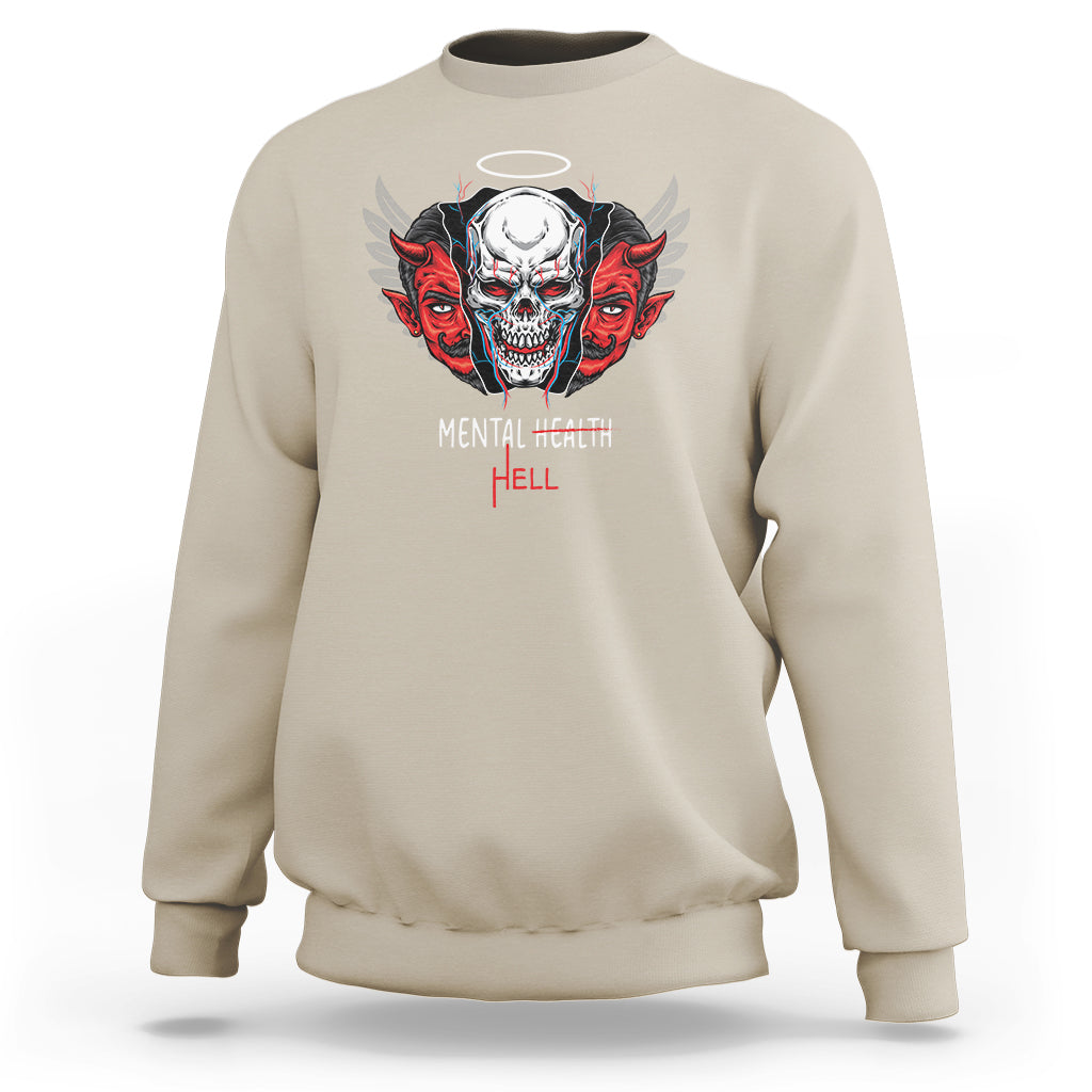 Beige sweatshirt with skull graphic, red wing accents, and front lettering