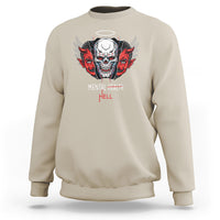 Beige sweatshirt with skull graphic, red wing accents, and front lettering
