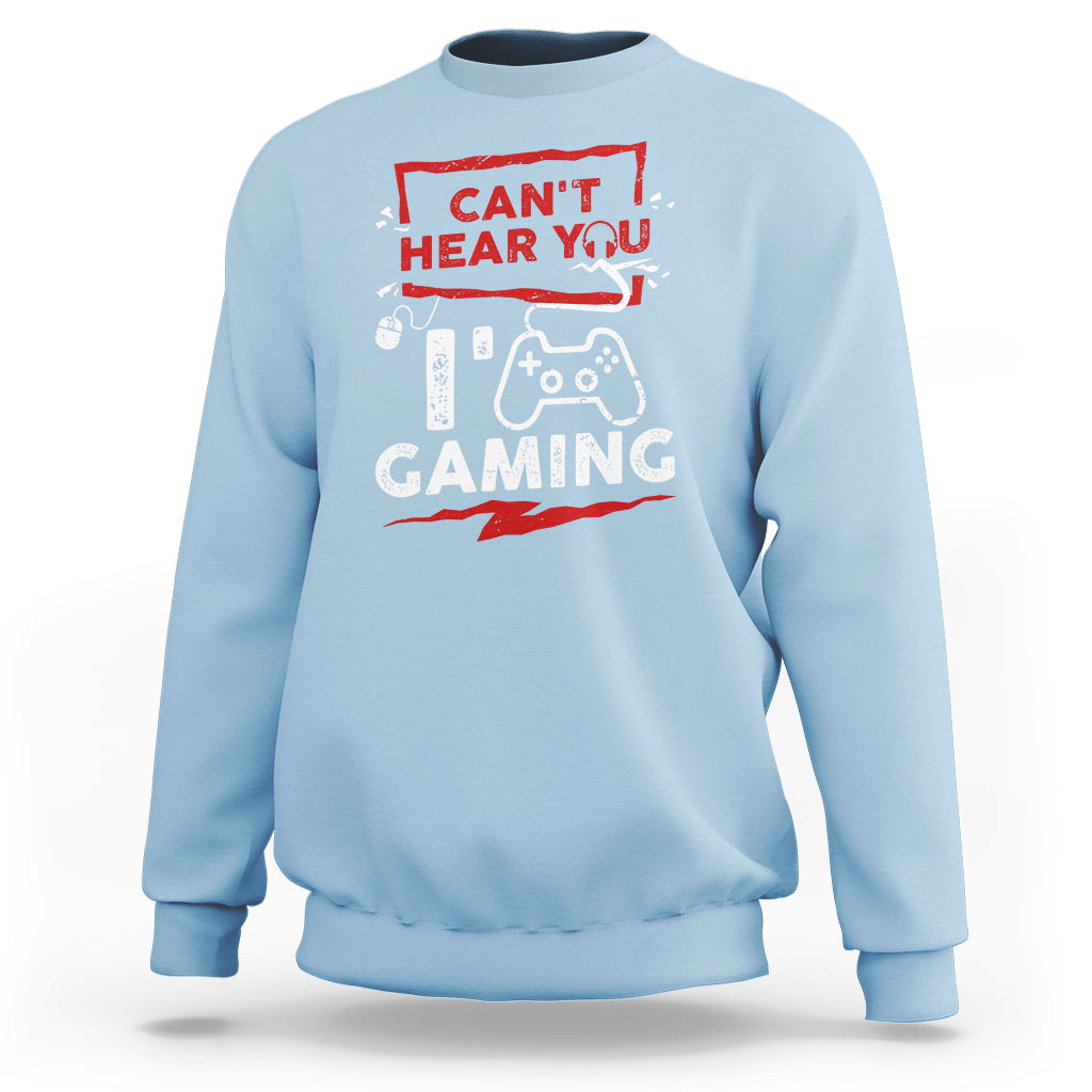 Light blue gaming sweatshirt with red 'Can't Hear You' controller and 'GAMING' print