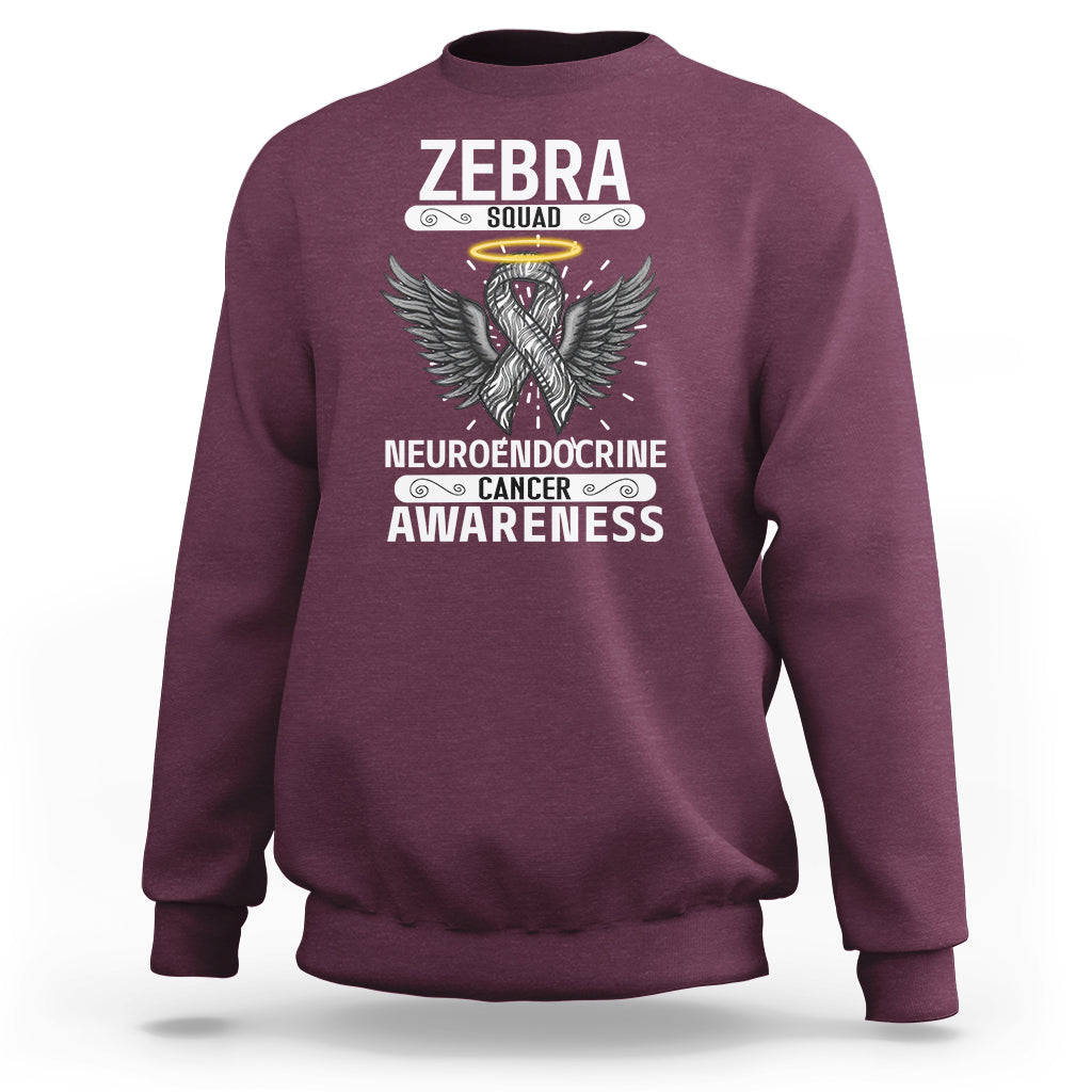 Maroon crewneck sweatshirt with long sleeves and Zebra Squad awareness graphic on front.