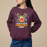 Kids crewneck sweatshirt in maroon with holiday nurse reindeer graphic