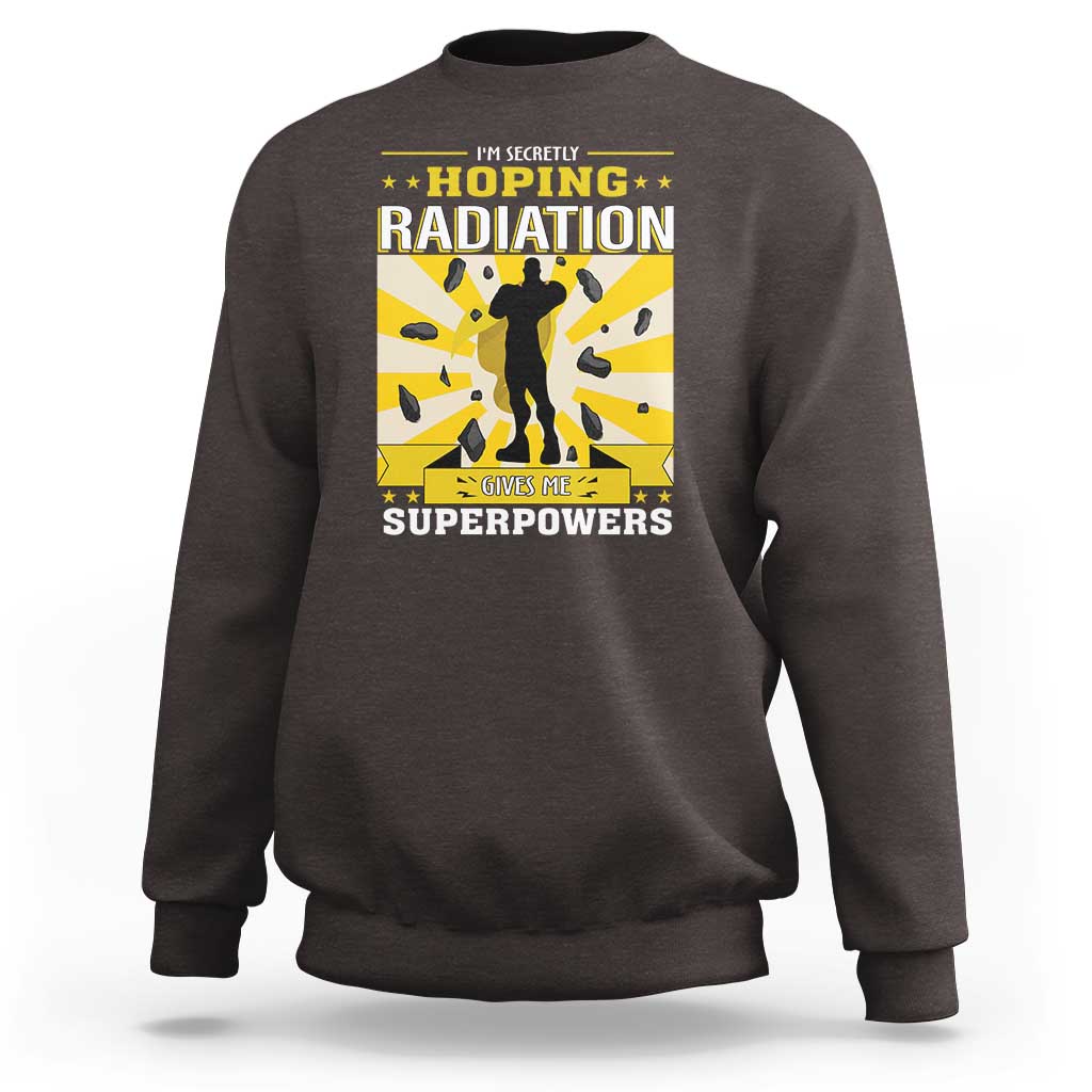 Dark chocolate crewneck sweatshirt with long sleeves and radiation awareness front graphic.