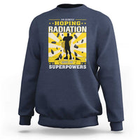 Navy crewneck sweatshirt with long sleeves and radiation awareness front graphic.