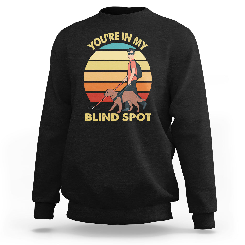 Black sweatshirt with front “You’re In My Blind Spot” graphic and long sleeves