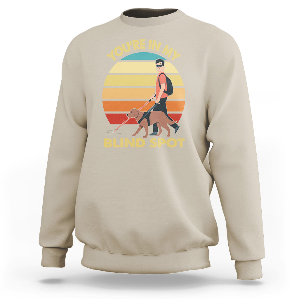 Sand sweatshirt with front “You’re In My Blind Spot” graphic and long sleeves